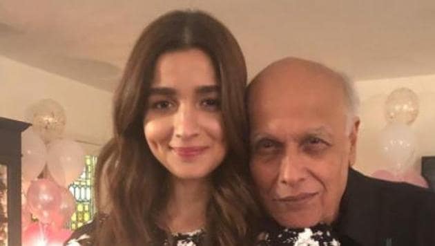 Alia Bhatt with her father Mahesh Bhatt on her birthday.(Twitter)