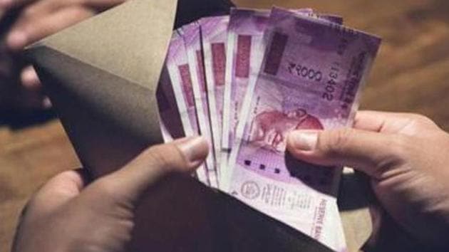 In two separate cases, three men were arrested for allegedly distributing money to residents of Navi Mumbai residential societies, allegedly to favour Nationalist Congress Party’s Parth Pawar. (PHOTO FOR REPRESENTATION PURPOSE ONLY) In two separate cases, three men were arrested for allegedly distributing money to residents of Navi Mumbai residential societies, allegedly to favour Nationalist Congress Party’s Parth Pawar. (PHOTO FOR REPRESENTATION PURPOSE ONLY)