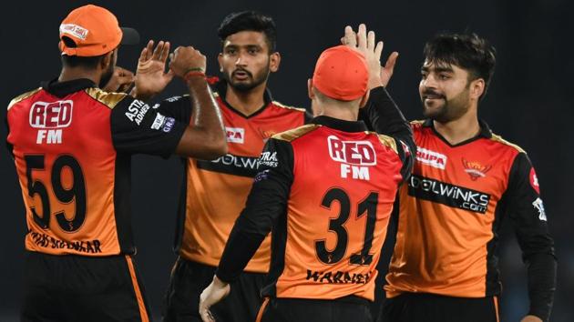 Sunrisers Hyderabad cricketer Rashid Khan (R) celebrates with teammates after taking the wicket of Kings XI Punjab batsman David Miller. (AFP)