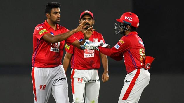 Kings XI Punjab cricketer captain and bowler Ravichandran Ashwin (L) celebrates with teammates. (AFP)