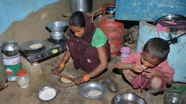 Reena Devi felt her life change when she got a cooking gas connection under the billion-dollar programme, meaning she no longer had to cook with wood or coal and breathe in smelly, toxic fumes. But Devi said she had to pay ₹3,000 for the “free” kit -- the equivalent of a month’s wages for most people in her village Nisarpura, in Bihar. (Narinder Nanu / AFP) Reena Devi felt her life change when she got a cooking gas connection under the billion-dollar programme, meaning she no longer had to cook with wood or coal and breathe in smelly, toxic fumes. But Devi said she had to pay ₹3,000 for the “free” kit -- the equivalent of a month’s wages for most people in her village Nisarpura, in Bihar. (Narinder Nanu / AFP)