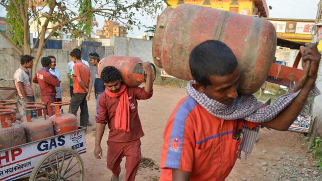 The government set aside ₹80 billion when the scheme was launched to fund the gas connections which it said would “empower” women, and have since extended that to ₹120 billion. The red gas canisters are emblazoned with the slogan “respecting the dignity of women”, and only women can qualify for the project. (Narinder Nanu / AFP) The government set aside ₹80 billion when the scheme was launched to fund the gas connections which it said would “empower” women, and have since extended that to ₹120 billion. The red gas canisters are emblazoned with the slogan “respecting the dignity of women”, and only women can qualify for the project. (Narinder Nanu / AFP)