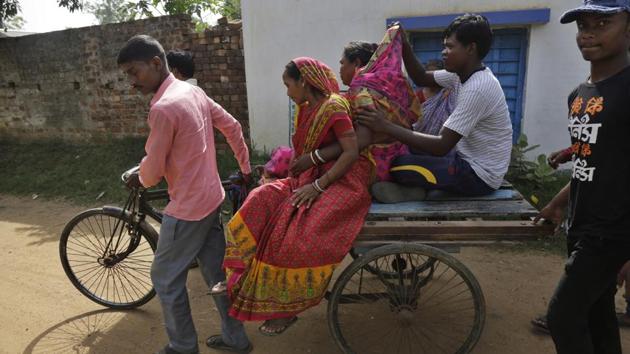 Voters travel to a polling station in a cycle cart in Bardhaman east constituency, West Bengal. Police baton charged agitators at a polling station in Bardhaman’s Jemua in Durgapur Lok Sabha constituency in West Bengal. A section of the voters in the polling booth were agitating since morning saying therewill be no polling if sufficient central forces were not deployed. (Bikas Das / AP) Voters travel to a polling station in a cycle cart in Bardhaman east constituency, West Bengal. Police baton charged agitators at a polling station in Bardhaman’s Jemua in Durgapur Lok Sabha constituency in West Bengal. A section of the voters in the polling booth were agitating since morning saying therewill be no polling if sufficient central forces were not deployed. (Bikas Das / AP)