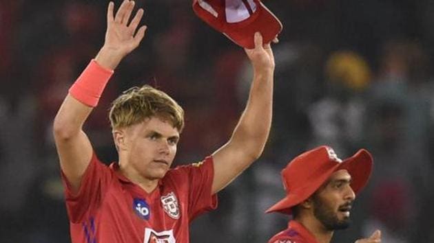 Kings XI Punjab (KXIP) player Sam Curran along with team members celebrates after claiming the wicket of DC's Colin Ingram during the Indian Premier League 2019.(PTI)