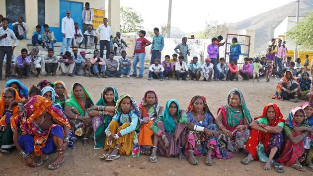 Voters wait in queues at a polling station at Sirohi district in Rajasthan. The state goes to polls for 1st time in the ongoing 7-phase general elections. The high-profile seats of Barmer, Nagaur, Jodhpur and Rajsamand will be among the parliamentary constituencies that will vote in the fourth phase of the 17th general election. (Amit Dave / REUTERS) Voters wait in queues at a polling station at Sirohi district in Rajasthan. The state goes to polls for 1st time in the ongoing 7-phase general elections. The high-profile seats of Barmer, Nagaur, Jodhpur and Rajsamand will be among the parliamentary constituencies that will vote in the fourth phase of the 17th general election. (Amit Dave / REUTERS)