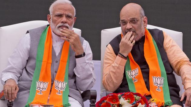 Prime Minister Narendra Modi with BJP chief Amit Shah.(AP file photo)