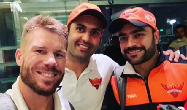 David Warner with SRH teammates Mohammad Nabi and Rashid Khani before leaving for Australia.(@rashidkhan_19)