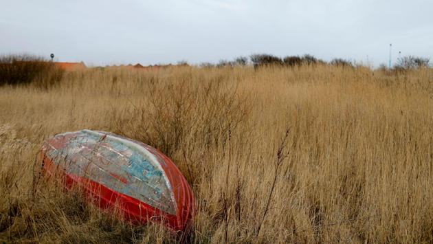 A boat lies in a field in the village of Thyboron. The choices are stark. He doesn’t want to return to his previous work, he doesn’t want to sell his boat for much less than it is worth. “If I was to sell it all when everyone is struggling, I would get nothing for my ship or my quotas. And of course I owe the bank a lot of money, which I’m sure they would like to get back.” (Andrew Kelly / REUTERS) A boat lies in a field in the village of Thyboron. The choices are stark. He doesn’t want to return to his previous work, he doesn’t want to sell his boat for much less than it is worth. “If I was to sell it all when everyone is struggling, I would get nothing for my ship or my quotas. And of course I owe the bank a lot of money, which I’m sure they would like to get back.” (Andrew Kelly / REUTERS)