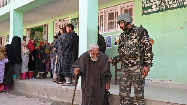 A security personnel helps an elderly Kashmiri voter after he voted during the fourth phase of Lok Sabha elections at Damhal Hanjipora, Kulgam district, Jammu and Kashmir, on April 29, 2019. (AFP) A security personnel helps an elderly Kashmiri voter after he voted during the fourth phase of Lok Sabha elections at Damhal Hanjipora, Kulgam district, Jammu and Kashmir, on April 29, 2019. (AFP)
