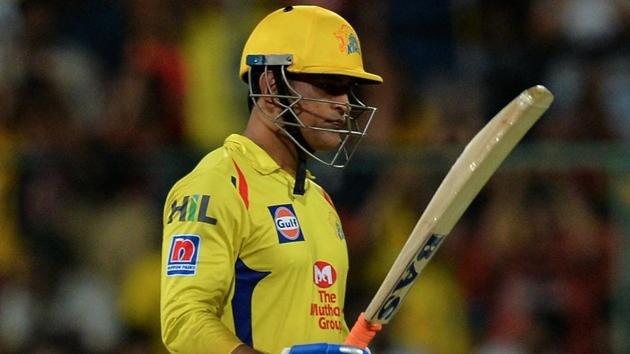 Chennai Super Kings captain and batsman MS Dhoni raises his bat to celebrate his fifty. (AFP) Chennai Super Kings captain and batsman MS Dhoni raises his bat to celebrate his fifty. (AFP)