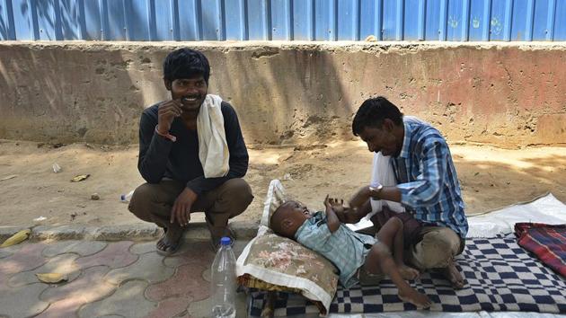 Mohammed Khalid, 42, (right), who lives in a night shelter for the homeless in Delhi, will vote for the first time in this Lok Sabha election.(Biplov Bhuyan/HT PHOTO)