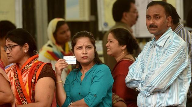 Mumbai, India - April 29, 2019: People stand in a line to cast their vote at jogeshwari in Mumbai, India, on Monday, April 29, 2019. (Photo by Satyabrata Tripathy/Hindustan Times)(Satyabrata Tripathy/HT Photo)