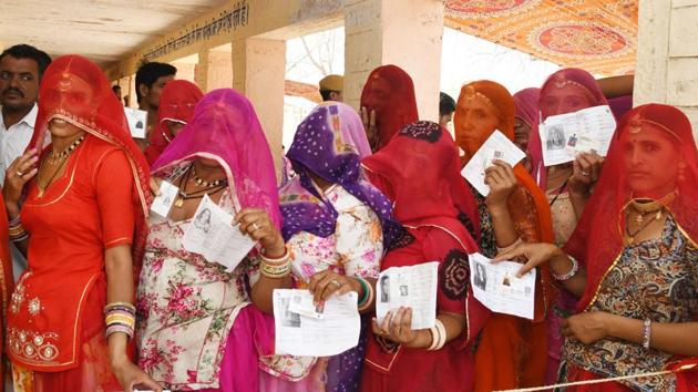 Jodhpur (Rajasthan), April 29 (ANI): The female voters standing in a queue to cast their votes at a polling station during the 4th Phase of lok sabha General Elections 2019 at Jodhpur in Rajasthan on Monday. (ANI Photo)