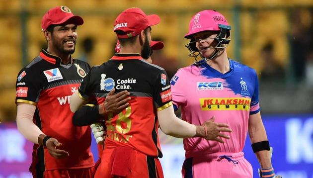 Bengaluru: RR. Batsman Steve Smith shakes hand with RCB Skipper Virat Kohli after the match was called off due to rain during the Indian Premier League 2019 (IPL T20) cricket match between Royal Challengers Bangalore (RCB) and Rajasthan Royals (RR)(PTI)