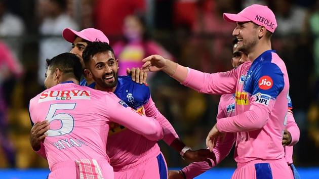 RR bowler Shreyas Gopal with team mates celebrates after taking the wicket of RCB batsman Marcus Stoinis. (PTI)