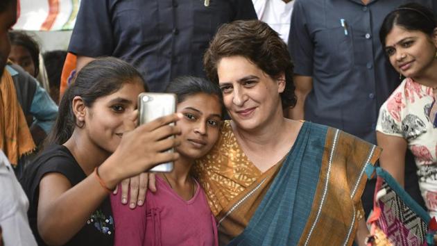 Congress General Secretary Priyanka Gandhi Vadra poses for a selfie with young supporters during an election campaign meeting for the Lok Sabha polls, in Amethi constituency, Tuesday, April 30, 2019. (PTI) Congress General Secretary Priyanka Gandhi Vadra poses for a selfie with young supporters during an election campaign meeting for the Lok Sabha polls, in Amethi constituency, Tuesday, April 30, 2019. (PTI)