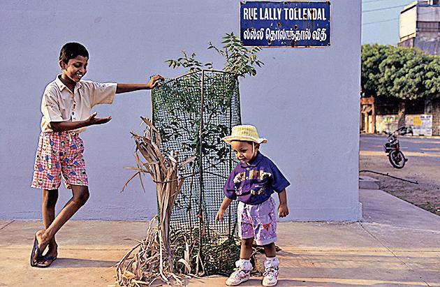 Children at the corner of Rue Lally Tollendal in the French quarter of Pondicherry in a photograph clicked in 1997.(Gamma-Rapho via Getty Images) Children at the corner of Rue Lally Tollendal in the French quarter of Pondicherry in a photograph clicked in 1997.(Gamma-Rapho via Getty Images)