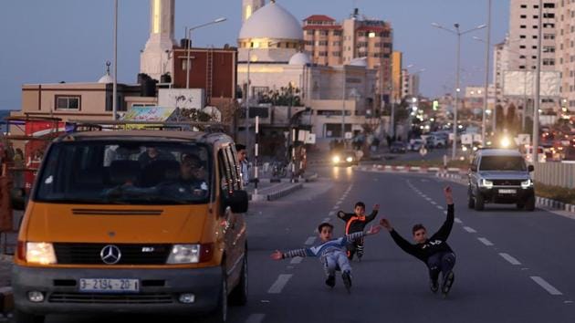 Palestinian boys of Gaza skating Team perform a heel-toe while rollerblading down on a street in Gaza City. “Gaza Skating Team” is a group of about 20 youths who hold weekly training sessions overseen by two coaches. (Mohammed Salem / REUTERS) Palestinian boys of Gaza skating Team perform a heel-toe while rollerblading down on a street in Gaza City. “Gaza Skating Team” is a group of about 20 youths who hold weekly training sessions overseen by two coaches. (Mohammed Salem / REUTERS)