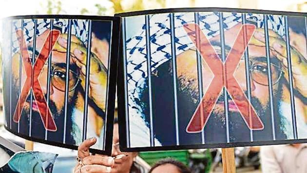 BJP supporters prepare to burn pictures of Pakistan-based terrorist Masood Azhar, in Ahmedabad on Thursday. (AFP) BJP supporters prepare to burn pictures of Pakistan-based terrorist Masood Azhar, in Ahmedabad on Thursday. (AFP)