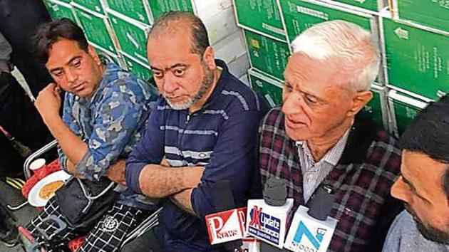 Roshan Lal Mewa after reopening his shop at Zainakadal — a commercial hub — in Srinagar on Wednesday.(HT Photo)