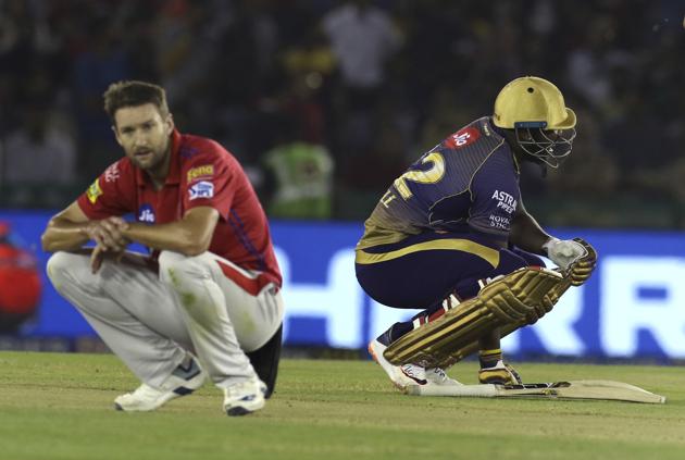 Kings XI Punjab's Andrew Tye, left, and Kolkata Knight Riders Andre Russell react during the IPL T20 cricket match between Kings XI Punjab and Kolkata Knight Riders in Mohali. (AP) Kings XI Punjab's Andrew Tye, left, and Kolkata Knight Riders Andre Russell react during the IPL T20 cricket match between Kings XI Punjab and Kolkata Knight Riders in Mohali. (AP)