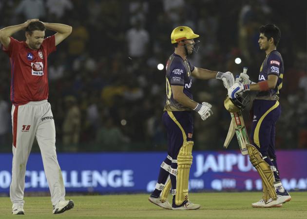 Kings XI Punjab's Andrew Tye, left, reacts as Kolkata Knight Riders Chris Lynn, center, and teammate Shubman Gill, right, celebrate during the IPL T20 cricket match between Kings XI Punjab and Kolkata Knight Riders in Mohali. (AP) Kings XI Punjab's Andrew Tye, left, reacts as Kolkata Knight Riders Chris Lynn, center, and teammate Shubman Gill, right, celebrate during the IPL T20 cricket match between Kings XI Punjab and Kolkata Knight Riders in Mohali. (AP)