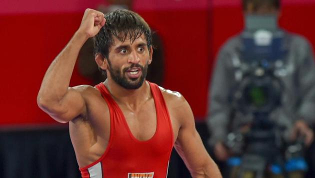 Jakarta: India's Bajrang Punia gestures after winning in the Finals of men's freestyle wrestling (65kg) against Japan's Daichi Takatani at the Asian Games 2018, in Jakarta on Sunday, August 19, 2018. (PTI Photo/Shahbaz Khan) (PTI8_19_2018_000214B) (PTI) Jakarta: India's Bajrang Punia gestures after winning in the Finals of men's freestyle wrestling (65kg) against Japan's Daichi Takatani at the Asian Games 2018, in Jakarta on Sunday, August 19, 2018. (PTI Photo/Shahbaz Khan) (PTI8_19_2018_000214B) (PTI)