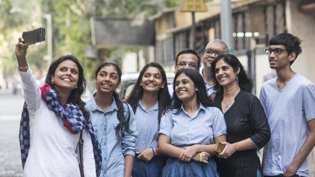 Mumbai, India - May 2, 2019: Podar schools CBSE toppers Aditi Patil Science 97%, Bhavyaa Srivastav Humanities 97%, Tanya Agarwal Commerce 97.4%, Aniket Das Science 97% pose for the photos out side the school in Mumbai, India, on Thursday, May 2, 2019. (Satish Bate/HT Photo) Mumbai, India - May 2, 2019: Podar schools CBSE toppers Aditi Patil Science 97%, Bhavyaa Srivastav Humanities 97%, Tanya Agarwal Commerce 97.4%, Aniket Das Science 97% pose for the photos out side the school in Mumbai, India, on Thursday, May 2, 2019. (Satish Bate/HT Photo)