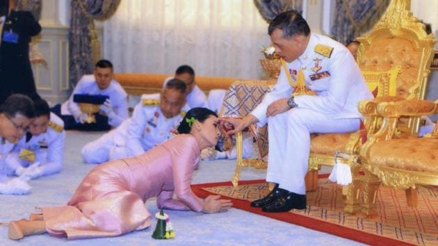 King Maha Vajiralongkorn and his consort, General Suthida Vajiralongkorn named Queen Suthida attend their wedding ceremony in Bangkok, Thailand. (Thailand Royal Household via REUTERS)