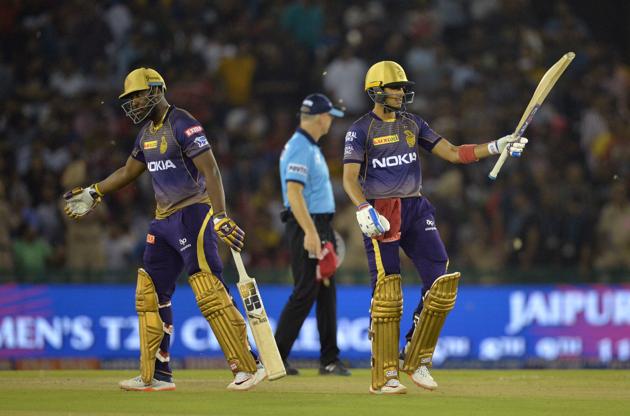 Kolkata Knight Riders cricketer Andre Russell (L) as his team mate Shubman Gill raises his bat after he scores half century (50 runs) plays during the 2019 Indian Premier League (IPL) Twenty20 cricket match between Kings XI Punjab and Kolkata Knight Riders at The Punjab Cricket Association Stadium in Mohali. (AFP) Kolkata Knight Riders cricketer Andre Russell (L) as his team mate Shubman Gill raises his bat after he scores half century (50 runs) plays during the 2019 Indian Premier League (IPL) Twenty20 cricket match between Kings XI Punjab and Kolkata Knight Riders at The Punjab Cricket Association Stadium in Mohali. (AFP)