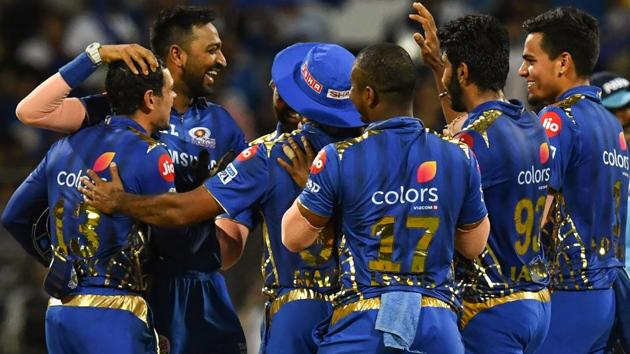Krunal Pandya celebrates a wicket with his teammates. (AFP) Krunal Pandya celebrates a wicket with his teammates. (AFP)