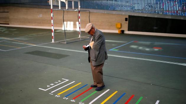 A man is seen outside of a polling station during Spain’s general election in Madrid, Spain. (Jon Nazca / REUTERS)