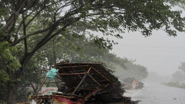 Street shops are seen collapsed due to gusty winds ahead of the landfall of cyclone Fani on the outskirts of Puri, in Odisha, Friday, May 3, 2019.(AP)