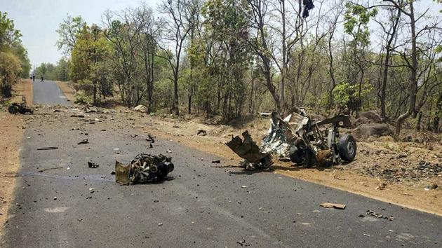 Gadchiroli: Mangled remains of a police vehicle, carrying 16 security personnel that was allegedly blasted by Maoists using IED, in Gadchiroli, Wednesday, May 1, 2019. (PTI) Gadchiroli: Mangled remains of a police vehicle, carrying 16 security personnel that was allegedly blasted by Maoists using IED, in Gadchiroli, Wednesday, May 1, 2019. (PTI)