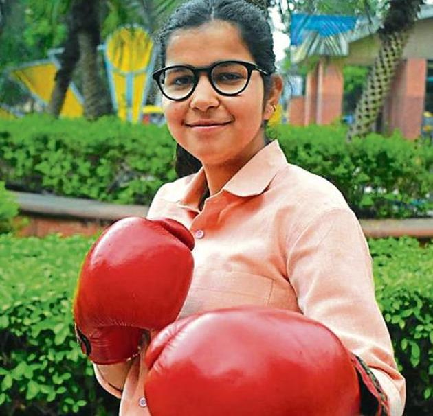Shivani Sharma, who won a bronze medal in state open boxing championship last year, wants to become an IAS officer (Yogesh Sharma/HT) Shivani Sharma, who won a bronze medal in state open boxing championship last year, wants to become an IAS officer (Yogesh Sharma/HT)
