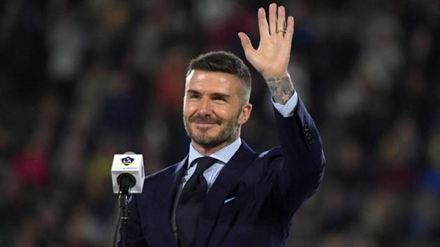 David Beckham acknowledges the crowd during LA Galaxy ring of honour ceremony at Dignity Health Sports Park.(USA TODAY Sports)