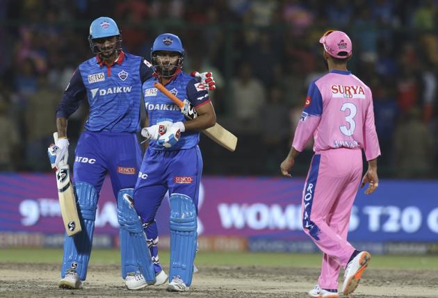 Delhi Capitals' Rishabh Pant and Axar Patel, left, celebrate their victory over Rajasthan Royals in their IPL T20 cricket match in New Delhi. (AP)