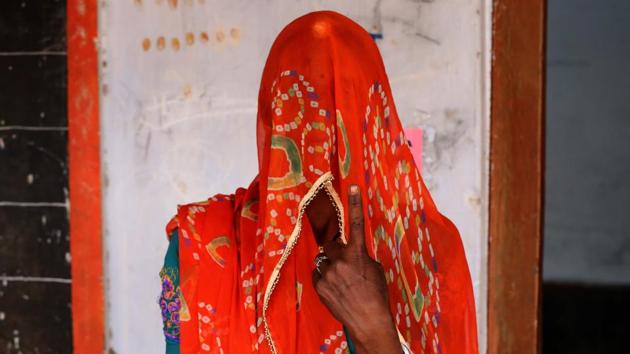 A voter shows her ink-marked finger after casting her vote for the fourth phase of India's general elections in the outskirts of Ajmer, in Rajasthan.Voting began for the fourth phase of India's general parliamentary elections as Indians exercise their franchise in the country's marathon election which started on April 11 and runs through to May 19 with the results to be declared on May 23. (Himanshu Sharma / AFP) A voter shows her ink-marked finger after casting her vote for the fourth phase of India's general elections in the outskirts of Ajmer, in Rajasthan.Voting began for the fourth phase of India's general parliamentary elections as Indians exercise their franchise in the country's marathon election which started on April 11 and runs through to May 19 with the results to be declared on May 23. (Himanshu Sharma / AFP)