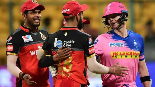 RR. Batsman Steve Smith shakes hand with RCB Skipper Virat Kohli after the match was called off due to rain . (PTI) RR. Batsman Steve Smith shakes hand with RCB Skipper Virat Kohli after the match was called off due to rain . (PTI)