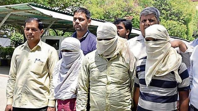 The three arrested men — Kamrul Kamaal, Sahidul Islam and Nazrul — in police custody on Saturday. (Sonu Mehta/HT PHOTO) The three arrested men — Kamrul Kamaal, Sahidul Islam and Nazrul — in police custody on Saturday. (Sonu Mehta/HT PHOTO)
