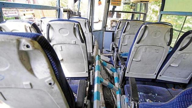 The bus was going towards the factory of Motherson Sumi Systems, located in Noida Phase 2. Police said the impact of the collision was so strong that the bus turned on its side. (Sunil Ghosh/HT Photo) The bus was going towards the factory of Motherson Sumi Systems, located in Noida Phase 2. Police said the impact of the collision was so strong that the bus turned on its side. (Sunil Ghosh/HT Photo)