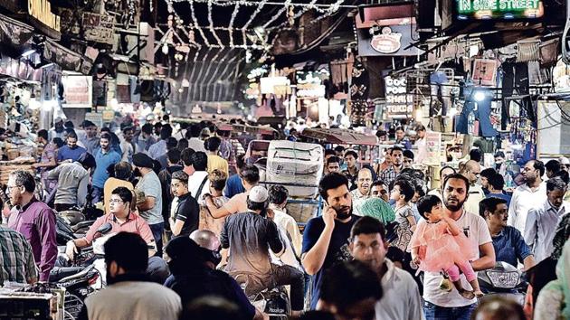 A crowded Matia Mahal near Jama Masjid (Above). Youngsters in old Delhi (Left) are quitting their cushy jobs to come to the aid their ‘neglected community’. And they say no votes if parties do not follow their ‘manifesto(Raj K Raj/HT PHOTOs)