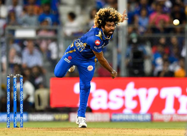 Mumbai Indians player Lasith Malinga bowls during the 2019 Indian Premier League (IPL) Twenty20 cricket match between Mumbai Indians and Kolkata Knight Riders at the Wankhede Stadium in Mumbai. (AFP)