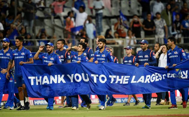 Mumbai: MI players take a victory lap during the Indian Premier League 2019 (IPL T20) cricket match between Kolkata Knight Riders (KKR) and Mumbai Indians (MI) at Wankhede Stadium in Mumbai. (PTI)