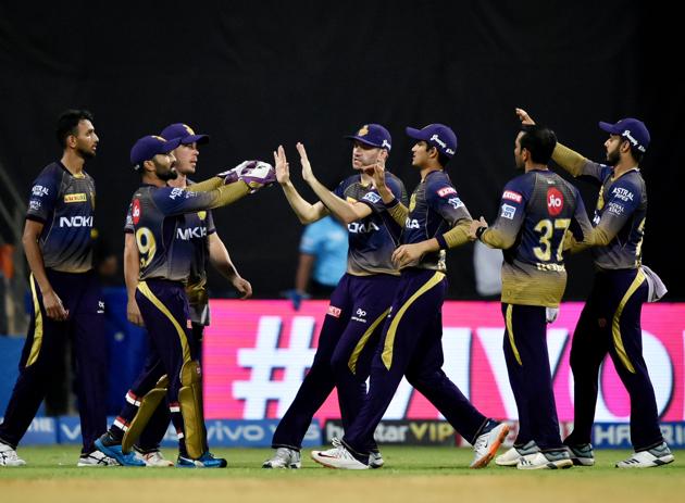 Mumbai: KKR player celebrate the dismissal of Quinton de Kock during the Indian Premier League 2019 (IPL T20) cricket match between Kolkata Knight Riders (KKR) and Mumbai Indians (MI) at Wankhede Stadium in Mumbai. (PTI)