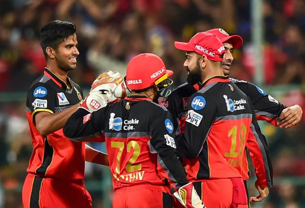 Washington Sundar tilted the match in RCB’s favour by picking up the wickets of Martin Guptill and Manish Pandey in the eighth over. (PTI) Washington Sundar tilted the match in RCB’s favour by picking up the wickets of Martin Guptill and Manish Pandey in the eighth over. (PTI)