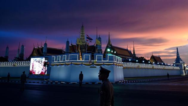 Royal Thai police stand guard near the Grand Palace in Bangkok ahead of Thailand's King Maha Vajiralongkorn's coronation. (Manan Vatsayana / AFP) Royal Thai police stand guard near the Grand Palace in Bangkok ahead of Thailand's King Maha Vajiralongkorn's coronation. (Manan Vatsayana / AFP)