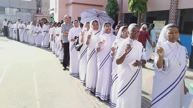Voters show their Identity cards as they wait in a queue to cast vote at a polling station in Ranchi. A 2019 phase-wise classification of Parliamentary Constituencies by 2014 results shows that the Bharatiya Janata Party (BJP) and its other National Democratic Alliance (NDA) partners had the highest seat share in the PCs which are going to polls today. (Diwakar Prasad / HT Photo) Voters show their Identity cards as they wait in a queue to cast vote at a polling station in Ranchi. A 2019 phase-wise classification of Parliamentary Constituencies by 2014 results shows that the Bharatiya Janata Party (BJP) and its other National Democratic Alliance (NDA) partners had the highest seat share in the PCs which are going to polls today. (Diwakar Prasad / HT Photo)