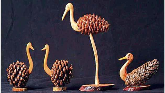 Garhwali woodcraft made with pine cones.(HT Photo)