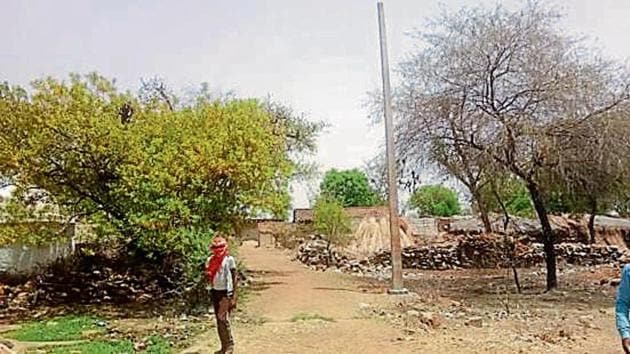 An electricity pole without cables in the village.(HT Photo)